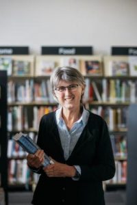 Library manager turns a new page