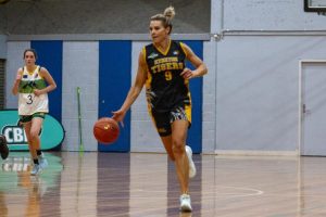 Tigers, Rockies women win